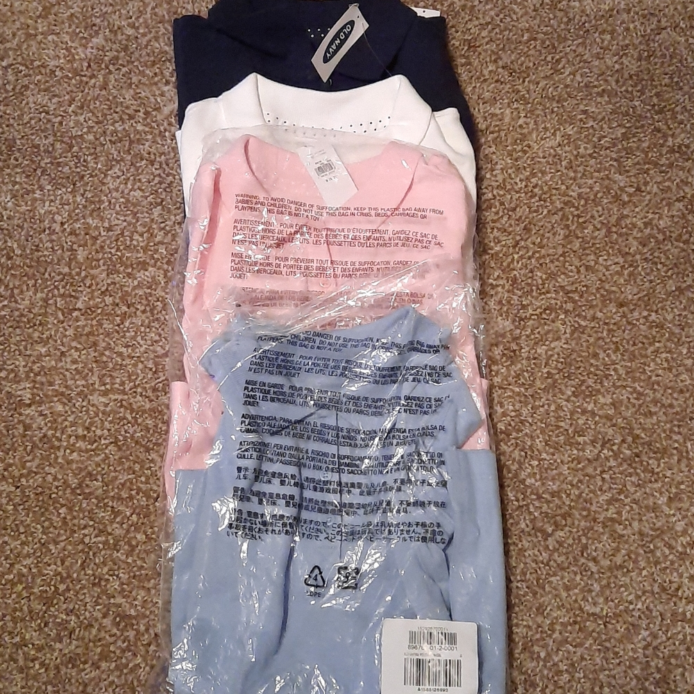 Five new  girls uniform shirts